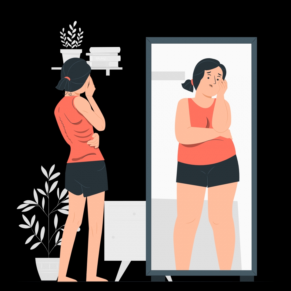 거울에 비친 자신의 몸이 실제보다 뚱뚱해보인다고 생각하는 여성. ⓒShutterstock