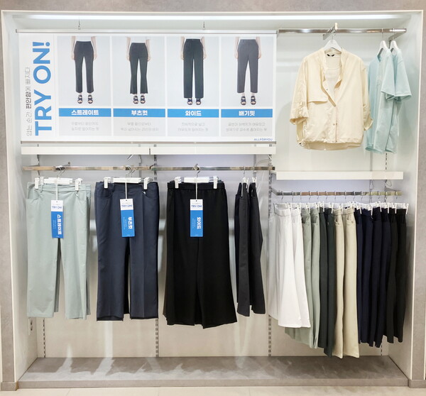 올포유 오프라인 매장 연출물. 2025 여름 팬츠 컬렉션이 종류 별로 진열된 모습이다. ⓒ 올포유