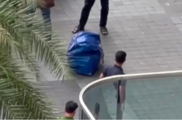 23일(현지시각) 베트남 호찌민시 한 고층 빌딩에서 자루 속에 담긴 한국인 남성 시신이 발견됐다 ⓒ베트남 청년신문 갈무리