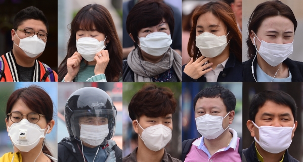 중국에서 발원한 황사의 영향으로 전국적으로 미세먼지가 기승을 부린 12일 오전 서울 종로구 광화문광장 일대에서 시민들이 마스크를 쓰고 출근을 하고 있다. ⓒ뉴시스·여성신문