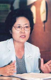 Lee Kim Hyun Sook / Senior Representative of the Womens Peace Society and Chair of the Womens Committee under the Preparatory Committee for the 2002 Joint National Celebrations