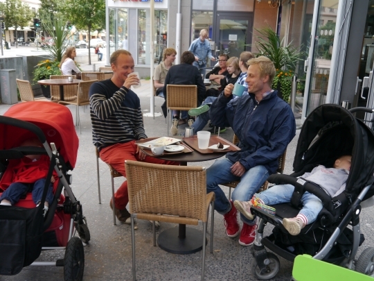 Latte Dads on parental leave in a cafe in central Stockholm, Sweden.