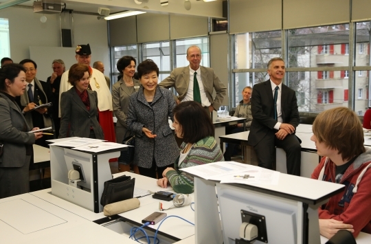On January 21, President Park Geunhye visits Commercial-Industrial Vocational School (GIBB) in Bern during her state visit to Switzerland.