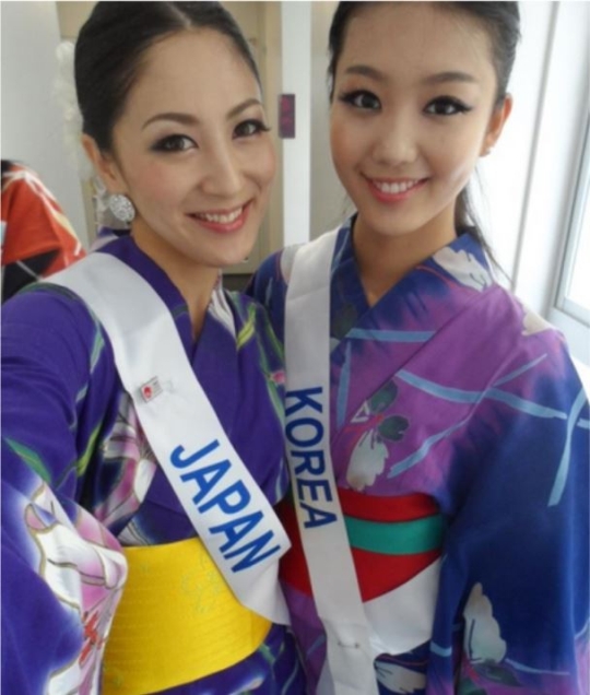 Korea’s representative to the Miss International pageant and Ikumi Yoshimatsu (left), the winner in 2012.